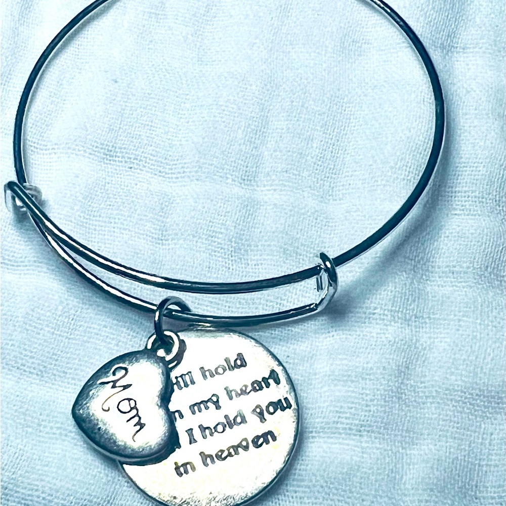 Silver bracelets with charms